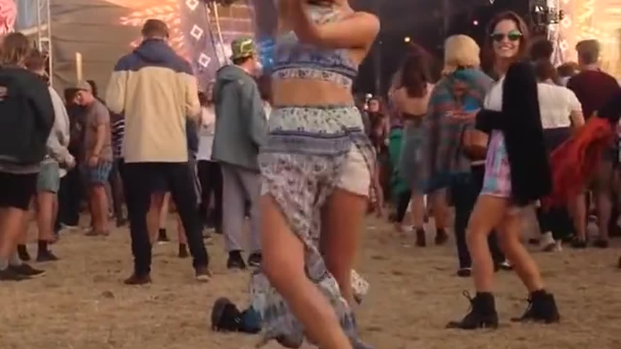 Beautifu Girl Doing Some Crazy Dance On Festival.