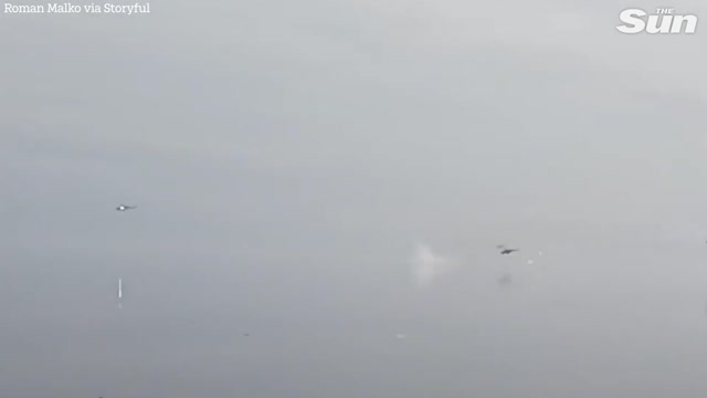 MOMENT 'RUSSIAN' Helicopter IS SHOT DOWN OVER RESERVOIR NEAR KYIV