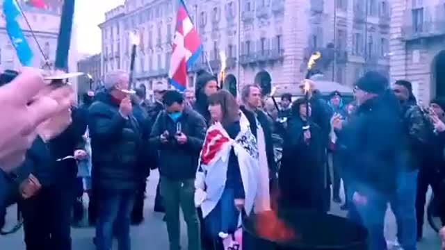 Italians burning their covid passports