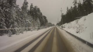 Overtaking Car Slides Into Oncoming Traffic Head-On