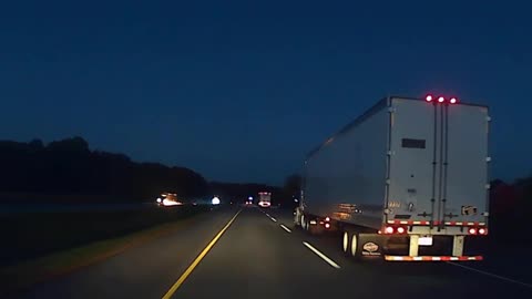 Flaming Tire Crosses Median and Clips Semi