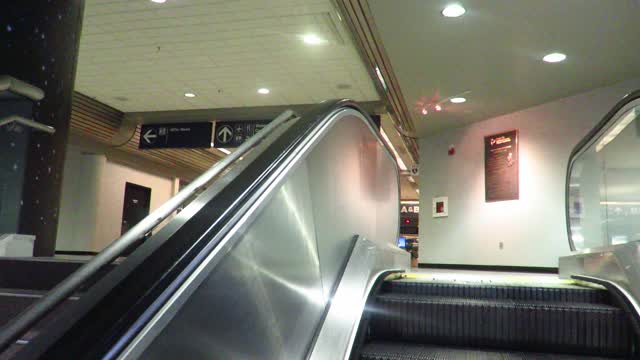 riding an escalator first person POV