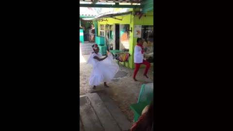 Couple Doing Traditional Columbian Dance In a Tourist Town.