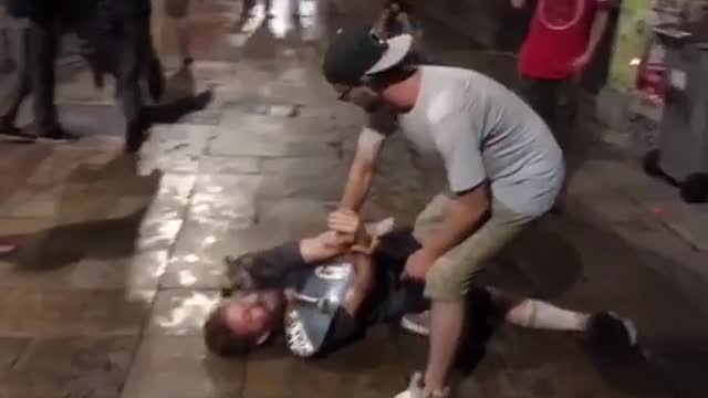 Man bun tries to skateboard slide through bottles