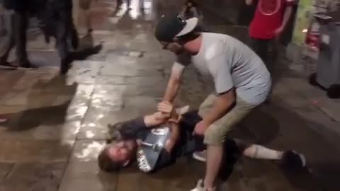 Man bun tries to skateboard slide through bottles