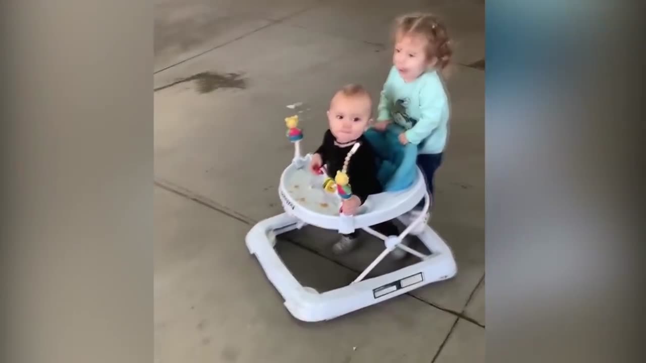 Big sister teaching Little brother how to walk, AMAZING