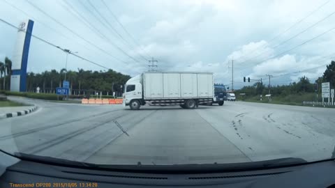 Truck Narrowly Escapes Crash