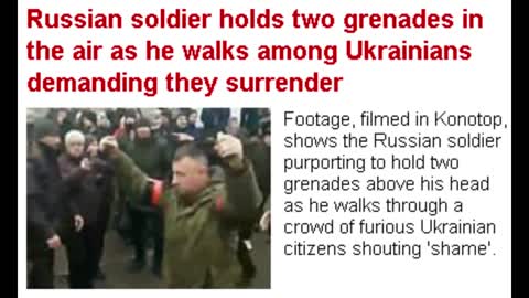 Russian Walking Through a Crowd of Ukrainians Holding These in His Hands!