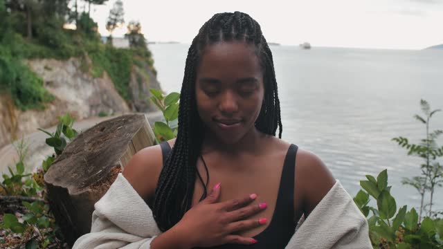A Woman Meditating Outdoors