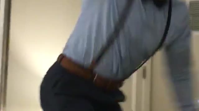 Music guy blue shirt on table screaming