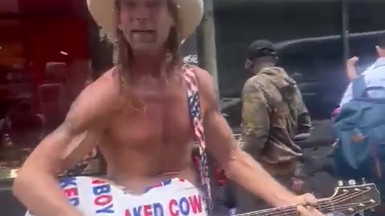 'Naked Cowboy' sings pro-border song in front of illegals