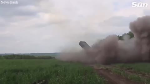 Russian multiple rocket launcher tank fires at Ukrainian targets