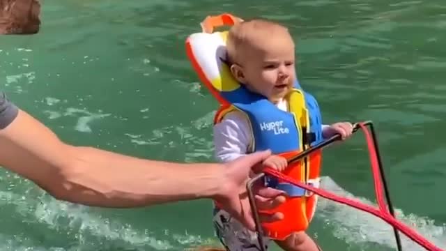 Surfing with baby