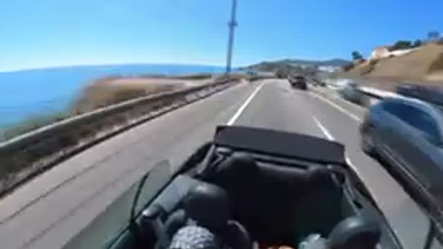Driving down Pacific Coast Highway in Malibu CA.