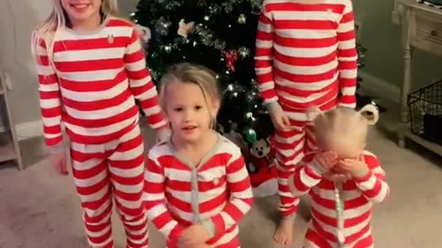 Children dance celebrating Christmas