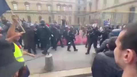 Police retreat amid chaotic scenes in France today.