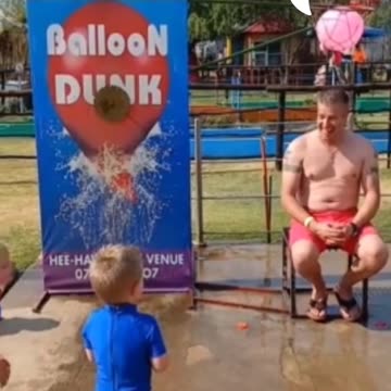 Energetic kid makes the perfect balloon dunk shorts videos