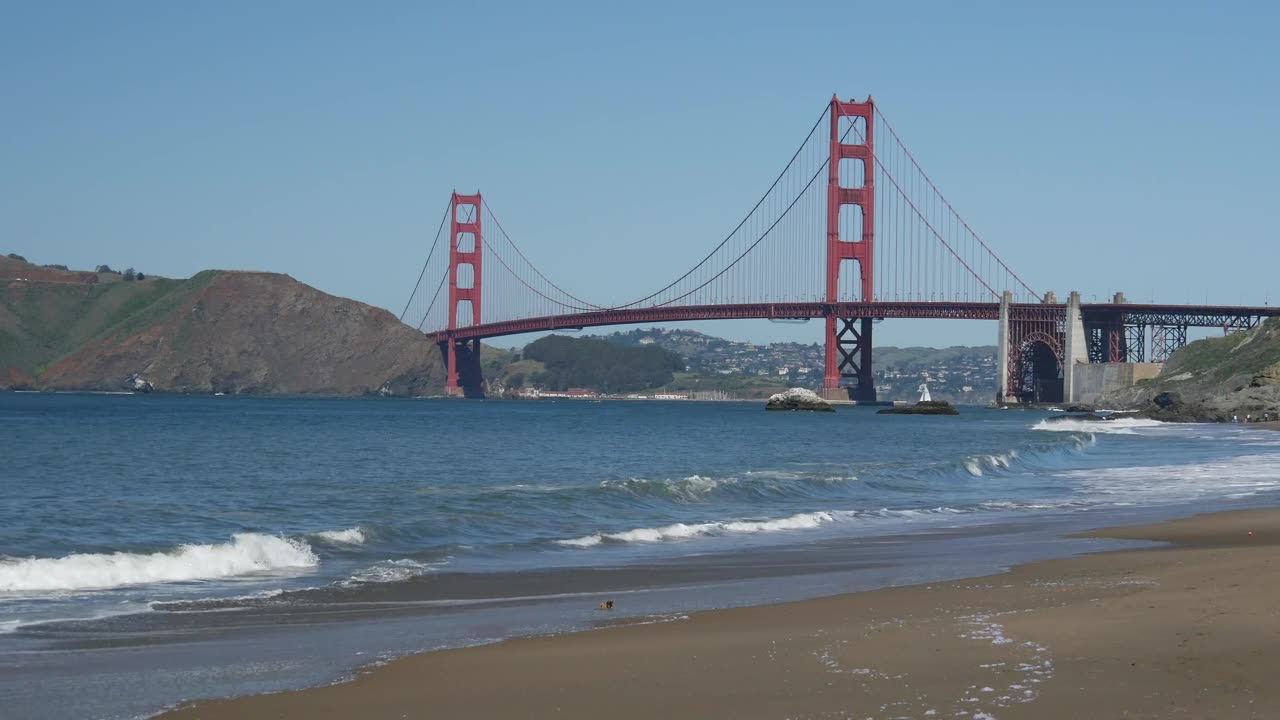 mixkit-beach-with-the-golden-gate-bridge