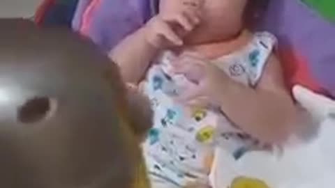 This Baby Thrilled with Minion Toy