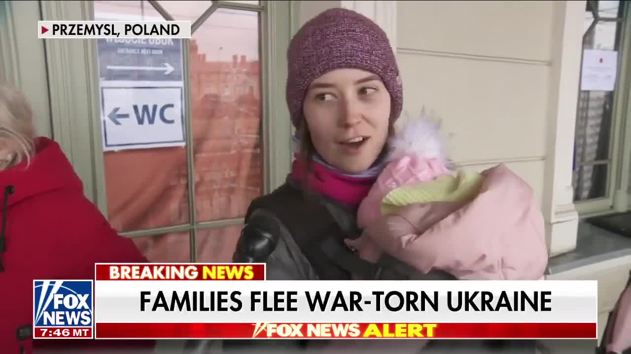 Ukrainian Refugee Wife/Mother breaks down talking about husband who stayed to fight.