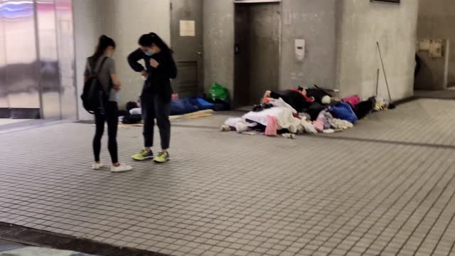 homeless guys@Tsim Sha Tsui tunnel