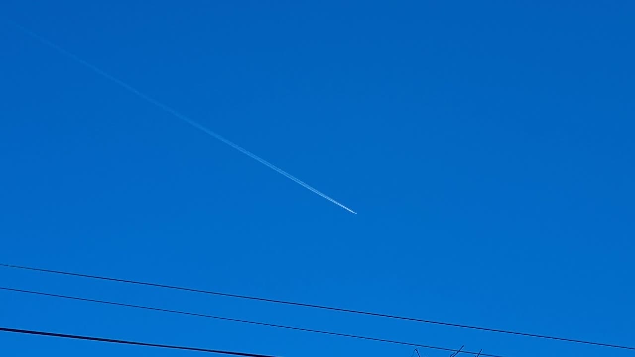 Contrail Above Wales.