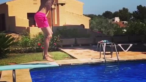 Collab copyright protection - pink swimsuit flip pool faceplant