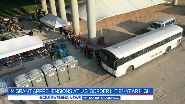 Migrant apprehensions at U.S. border hit 21-year high