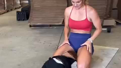 woman exercising with child