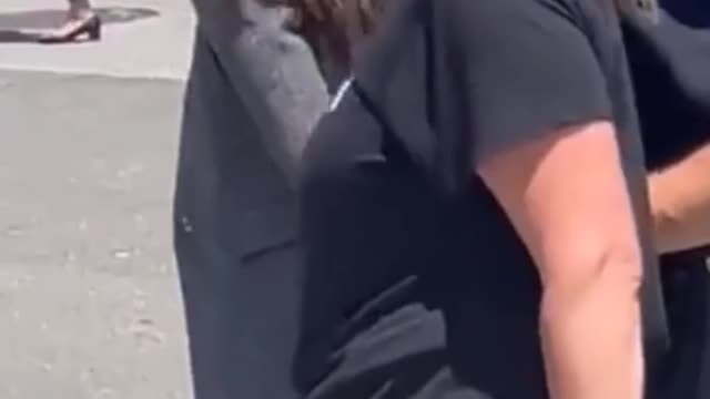 AOC escorted with invisible handcuffs