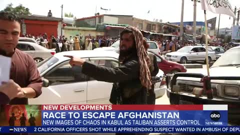 ABC News reporters who were trying to get to the airport were blocked by two armed Taliban members