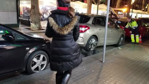 Car being towed in Barcelona.