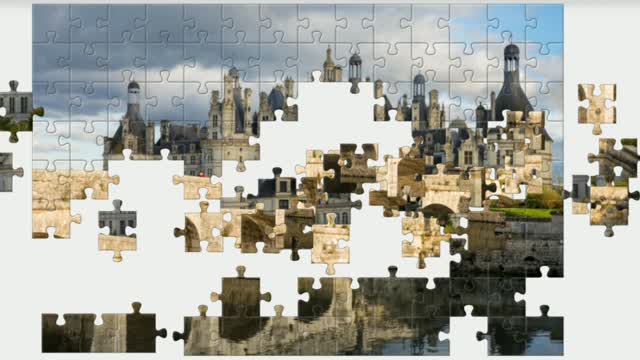 Puzzle. Chambord castle and bridge. France.