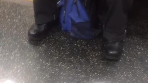 At a loss for words person clips nails on subway