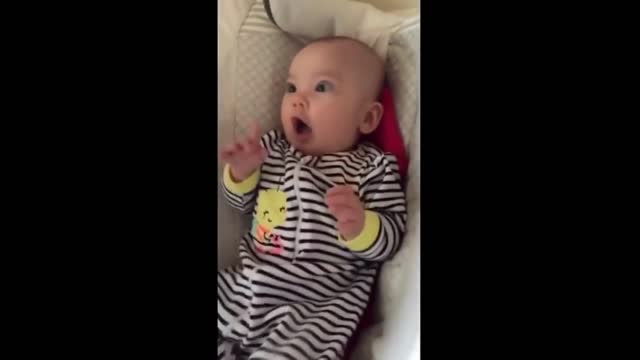 Toddler making funny face when hearing his favorite toy