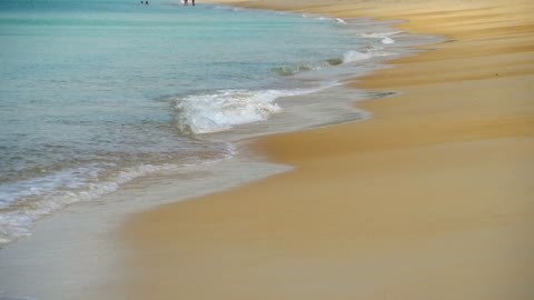 Waves on sandy beach