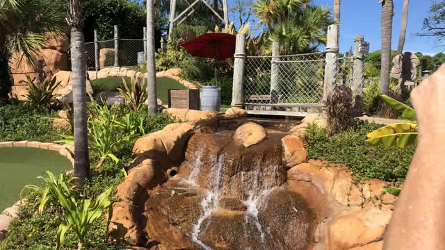 My Grandson playing mini golf and then being a spy.