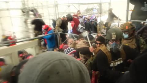 Who is the Everywhere Man #RedonRedGlasses Capitol Jan 6 at the Inauguration Stage