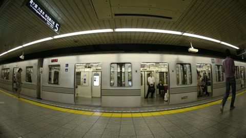 Fisheye lens shot of the subway arriving