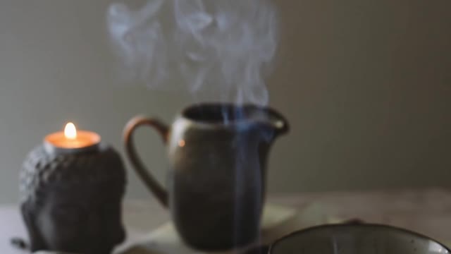 melted-chocolate-in-a-bowl-and-a-burning-incense