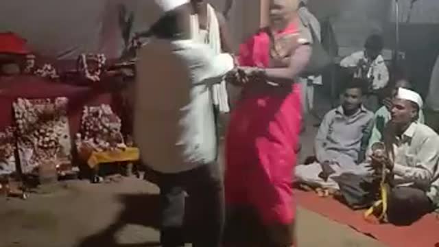 Farmer Couple Dance during Gods Festival