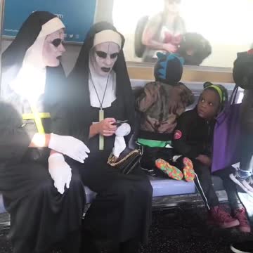 Two scary nun costumes train scared little kid dinosaur