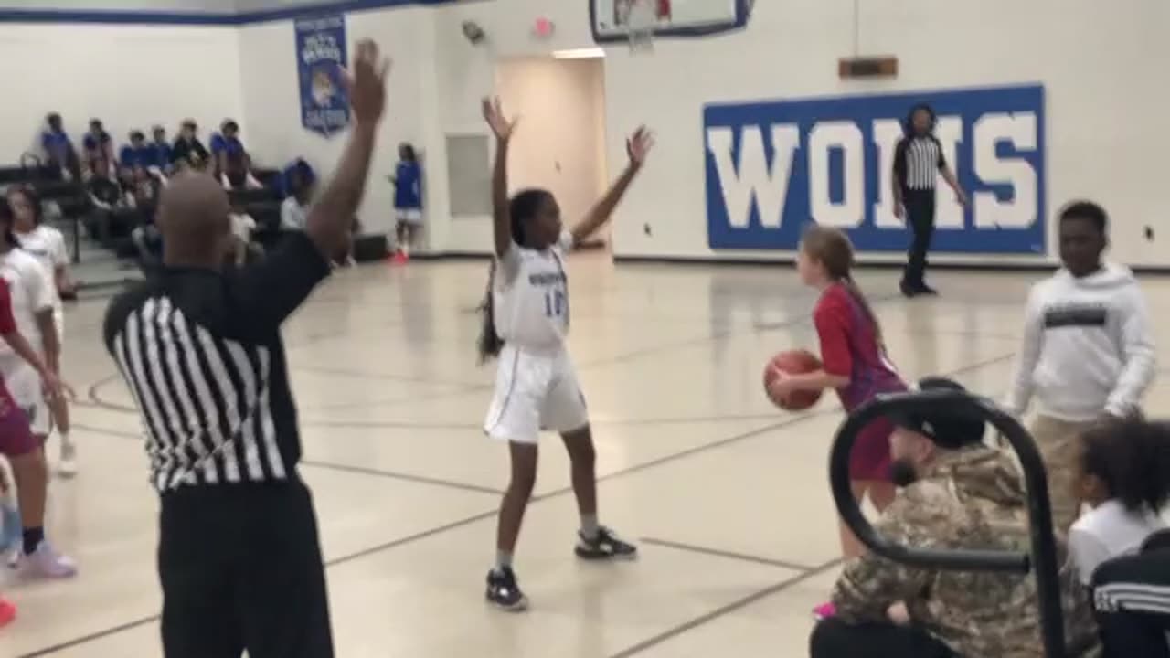 The 5'8" Tall 7th Grader #12 is improving with each game in Defense and Offense.