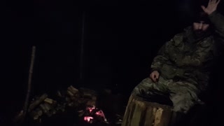 test footage for lighting, camera postion and audio before filming a vlog next to a campfire