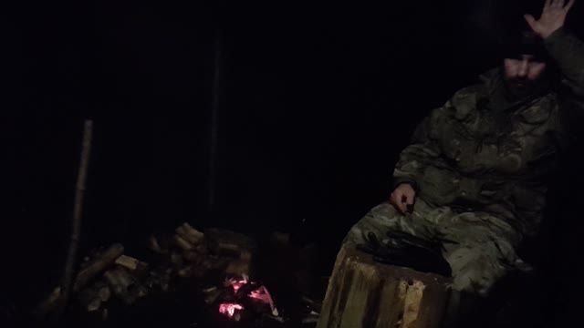 test footage for lighting, camera postion and audio before filming a vlog next to a campfire