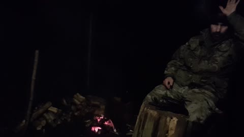 test footage for lighting, camera postion and audio before filming a vlog next to a campfire