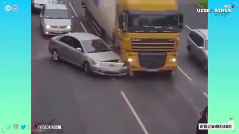 Truck destroys merging car and itself