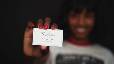 Woman Holding Thank You Card