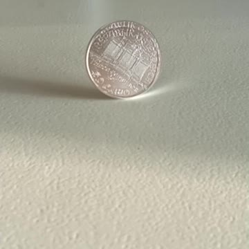 1oz silvercoin spinning slow motion