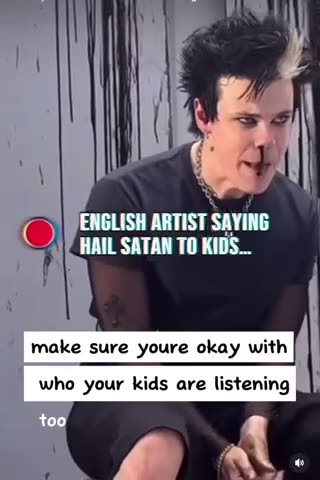 English artist Yungblud hailing Satan.